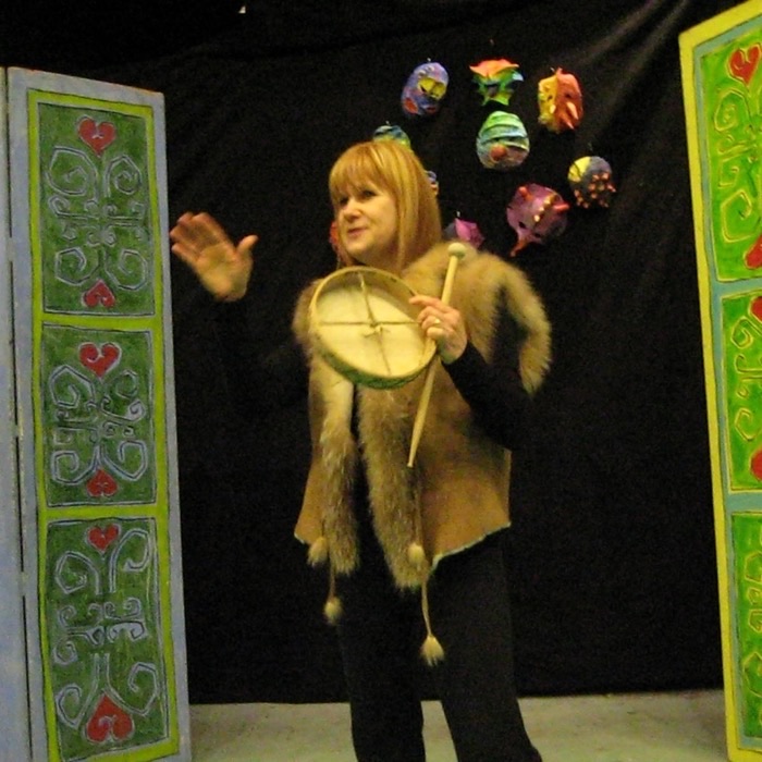 Sue Morrison holding a frame drum